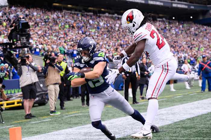 Seattle Seahawks wide receiver Jake Bobo (19) catches a pass for a touchdown over Arizona Cardinals cornerback Starling Thomas V (24) during the first half at Lumen Field.